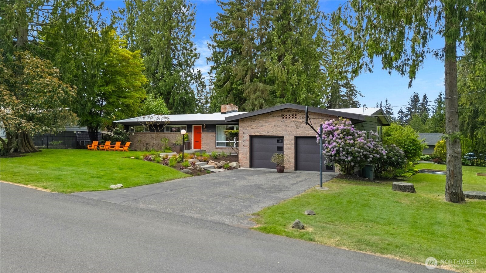 18722 84th Avenue West Edmonds, WA 98026 - Photo 5 of 40 a front view of a house with a garden and porch
