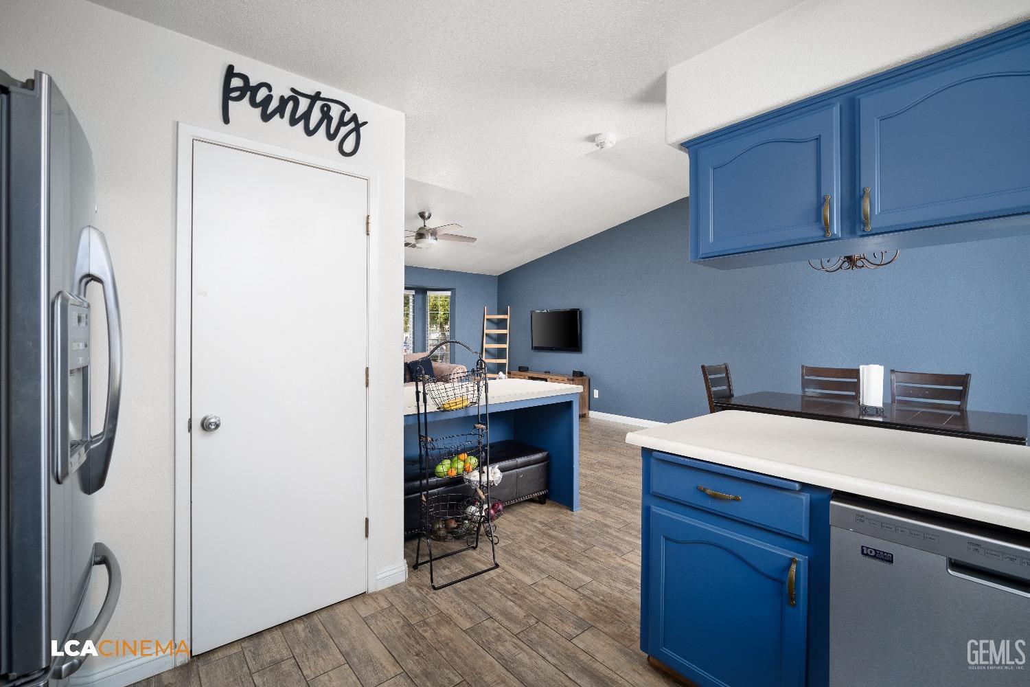 Undisclosed Address McFarland, CA 93250 - Photo 12 of 24 a room with a sink cabinets and wooden floor