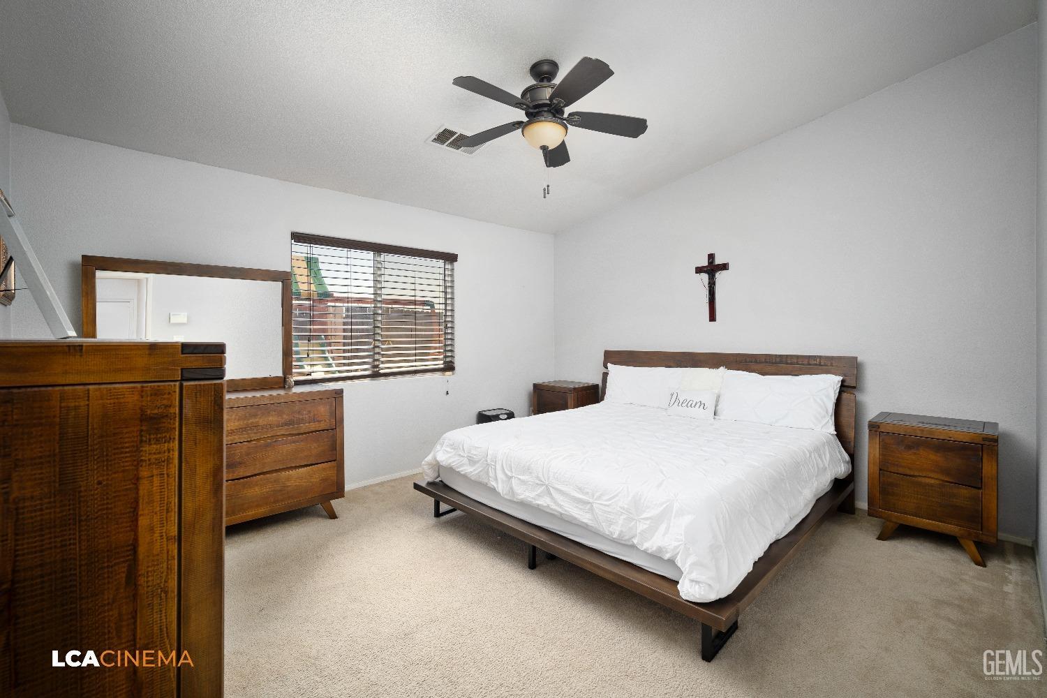 Undisclosed Address McFarland, CA 93250 - Photo 14 of 24 a bedroom with a bed and window