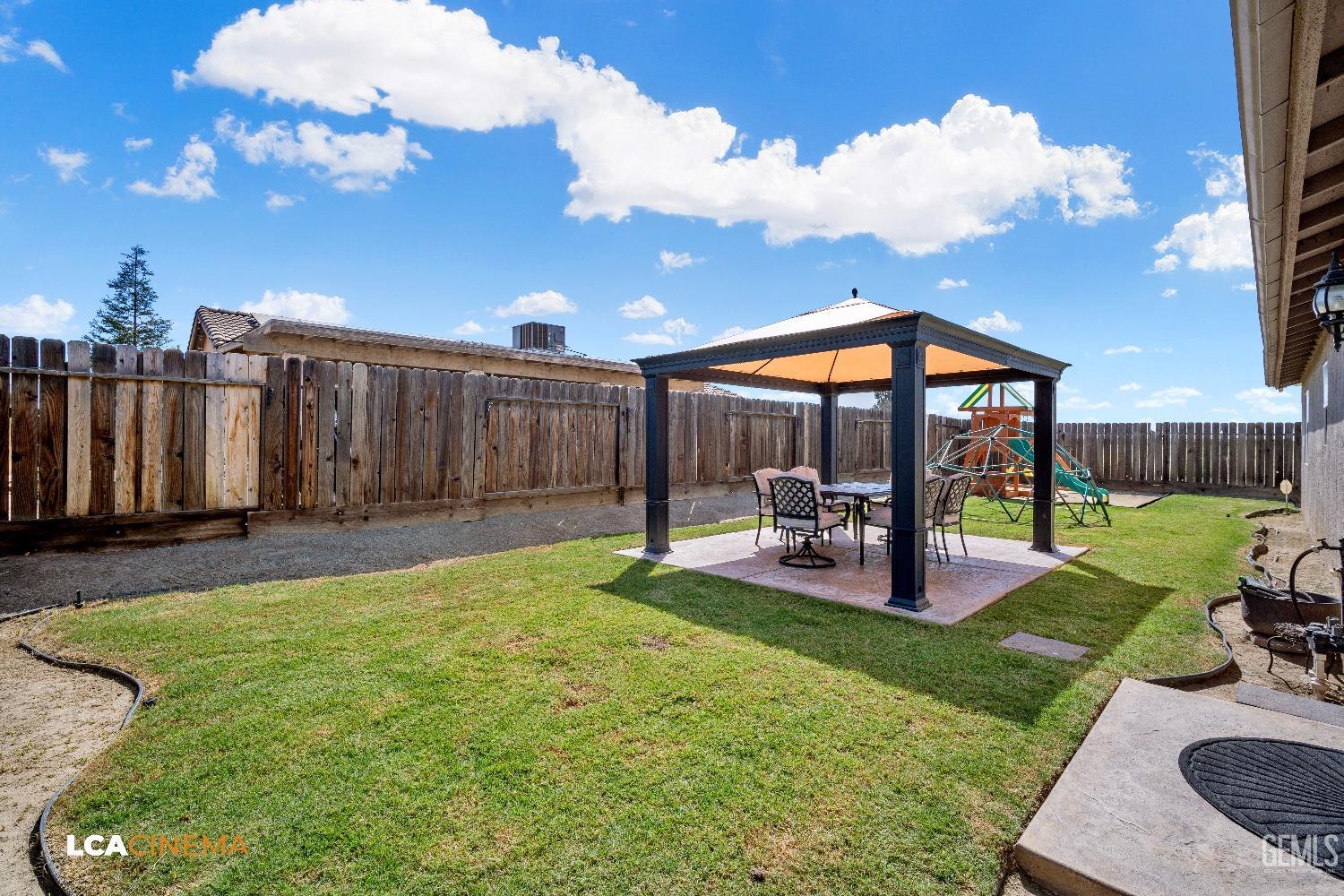 Undisclosed Address McFarland, CA 93250 - Photo 21 of 24 a view of a backyard with sitting area and furniture