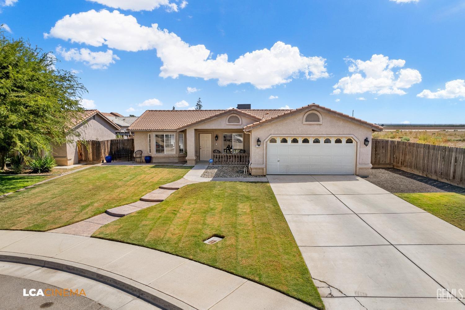 Undisclosed Address McFarland, CA 93250 - Photo 3 of 24 a view of swimming pool with a garden