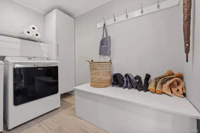 a bathroom with a sink and a washing machine