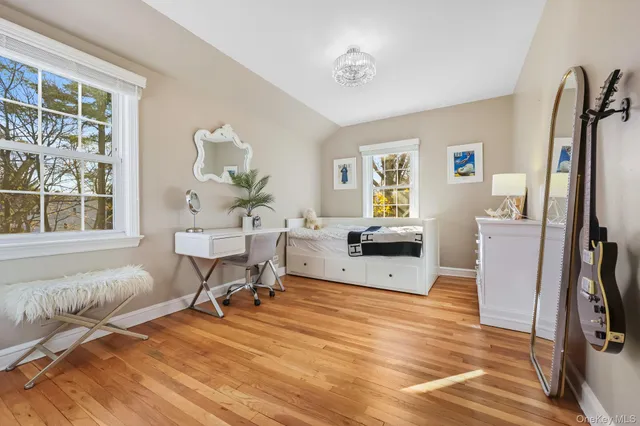a living room with furniture window and a table