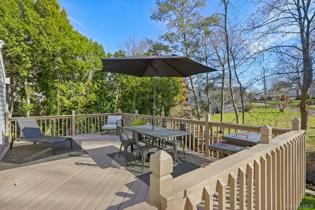 a view of a chairs and table in the deck