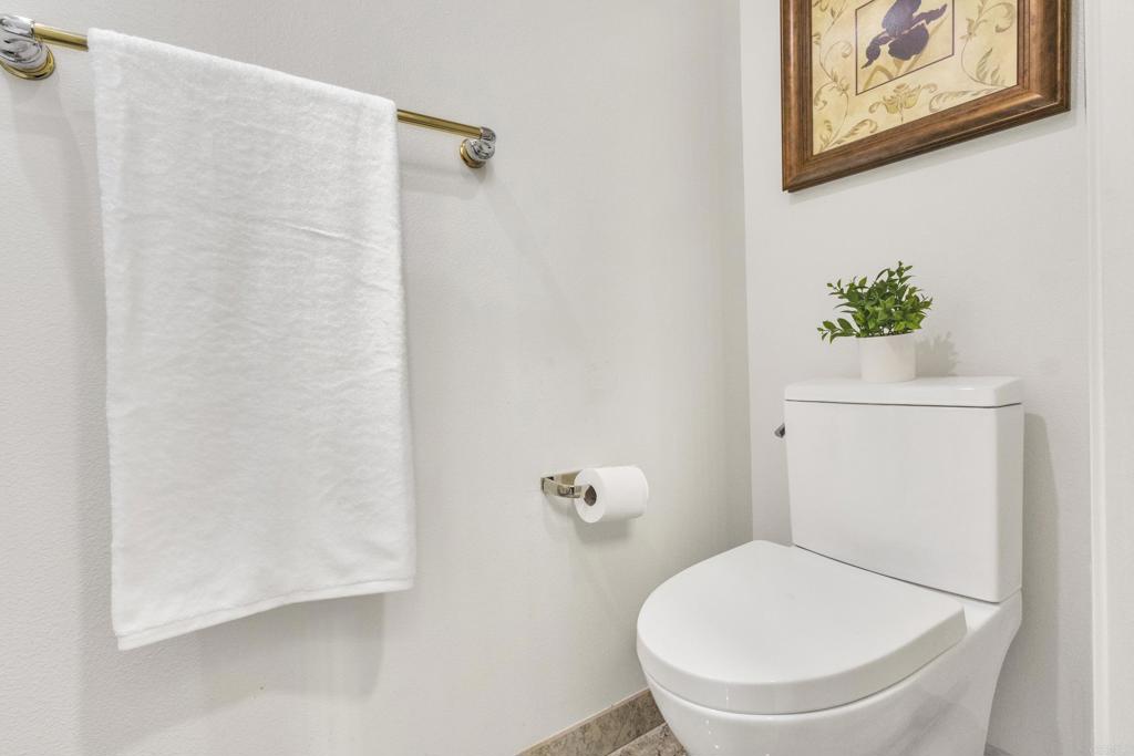 13740 Gateway View Drive El Cajon, CA 92021 - Photo 15 of 45 a white toilet sitting next to a white wall