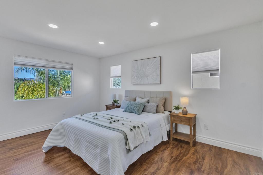 13740 Gateway View Drive El Cajon, CA 92021 - Photo 18 of 45 a bedroom with a bed and a window