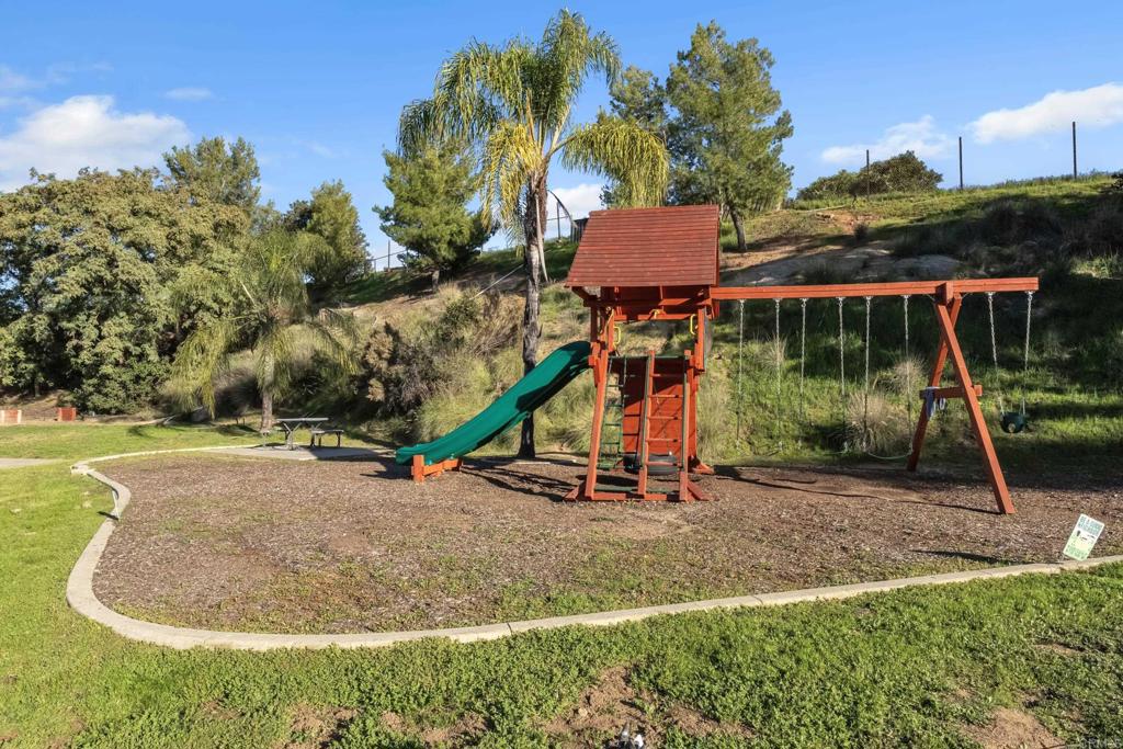 13740 Gateway View Drive El Cajon, CA 92021 - Photo 38 of 45 a childrens park with lots of swings and slides