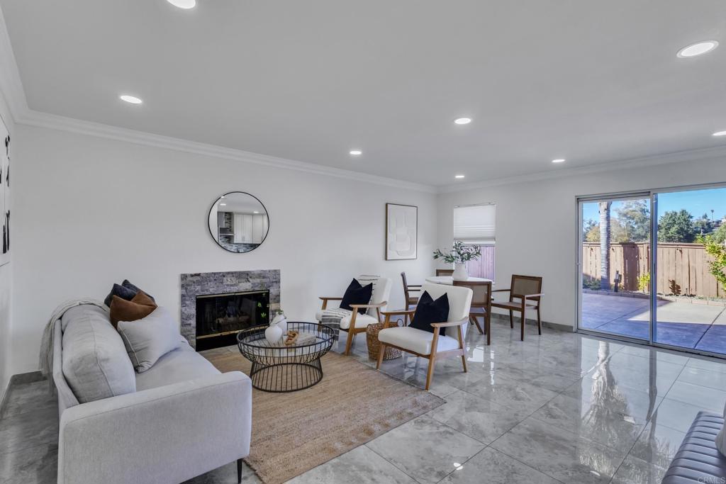 13740 Gateway View Drive El Cajon, CA 92021 - Photo 6 of 45 a living room with furniture and a fireplace