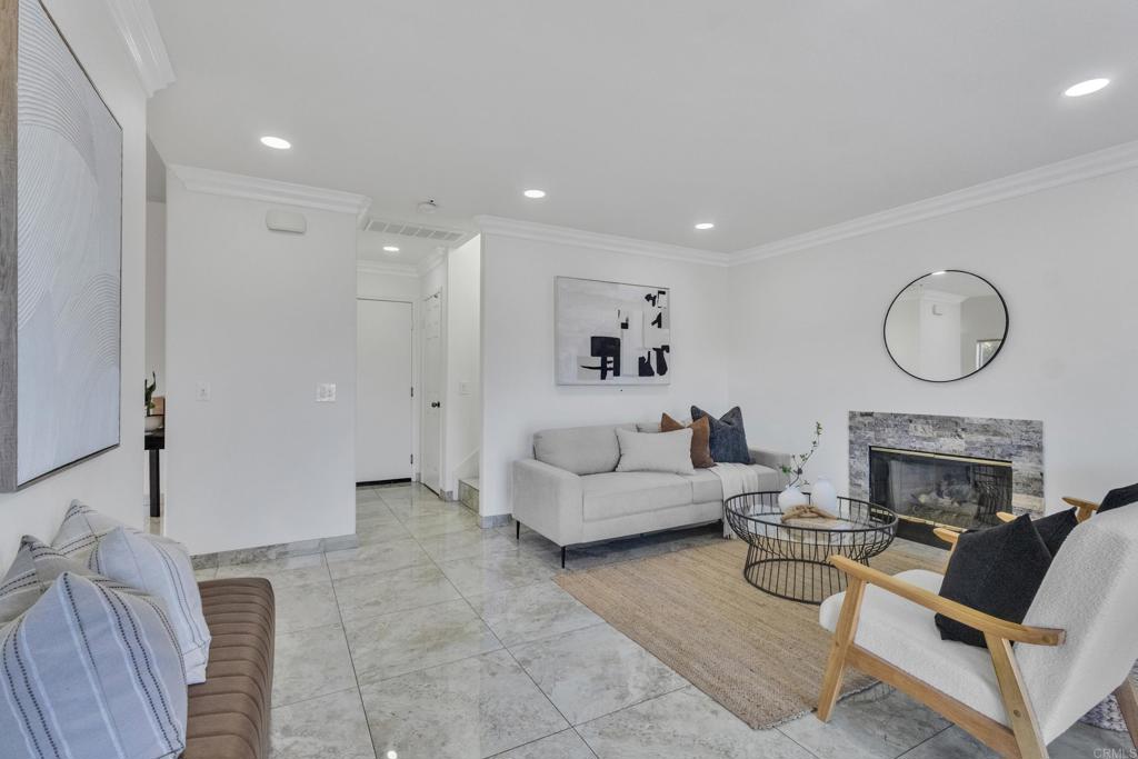 13740 Gateway View Drive El Cajon, CA 92021 - Photo 7 of 45 a living room with furniture a fireplace and a flat screen tv