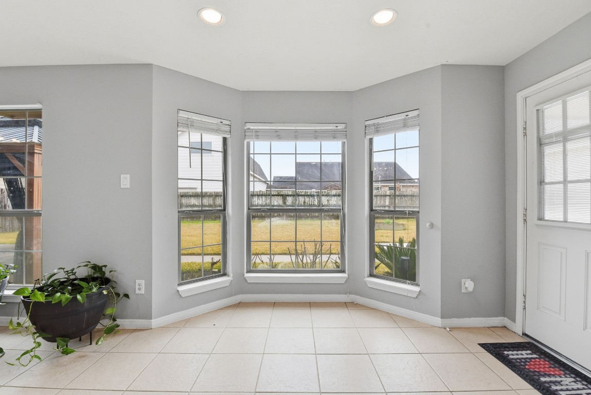 6534 Granbury Road Manvel, TX 77578 - Photo 26 of 49 a view of an empty room with a window