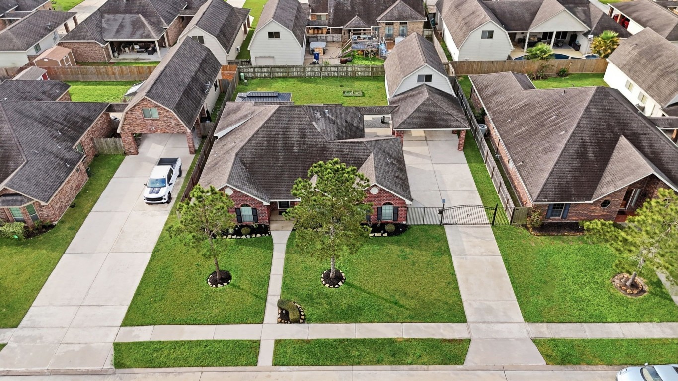 6534 Granbury Road Manvel, TX 77578 - Photo 4 of 49 an aerial view of a house