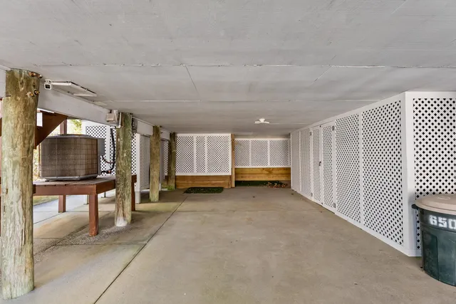 a view of a livingroom with furniture and a window