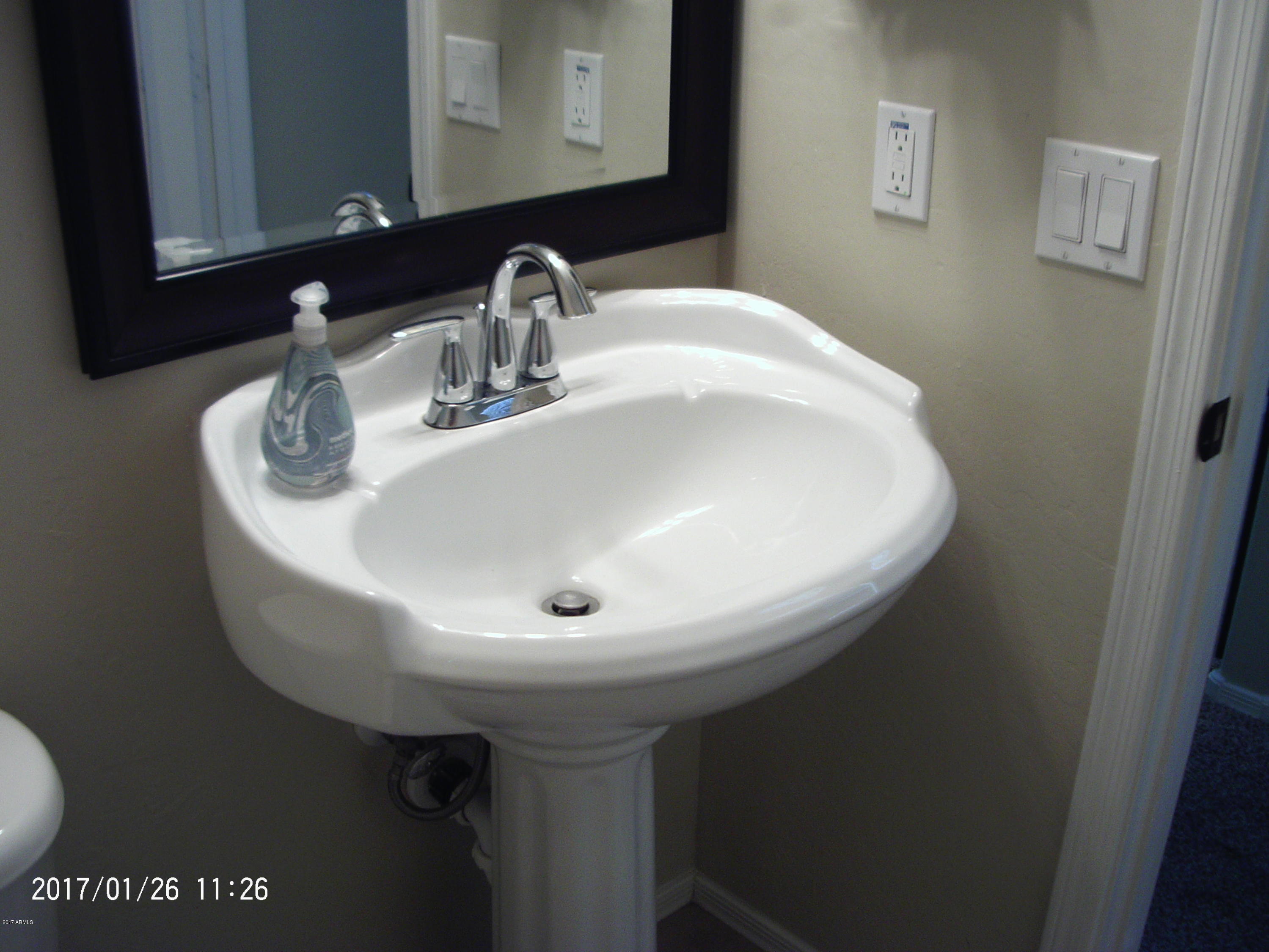 4235 East Betsy Lane Gilbert, AZ 85296 - Photo 18 of 31 First floor 1/2 bath