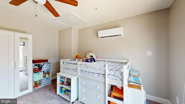 a utility room with toys and stairs