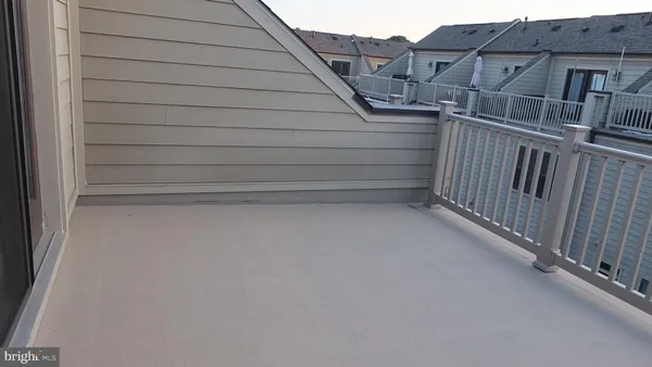 a front view of a house with a balcony