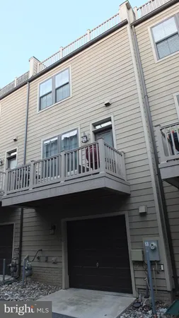 a view of brick building with large windows