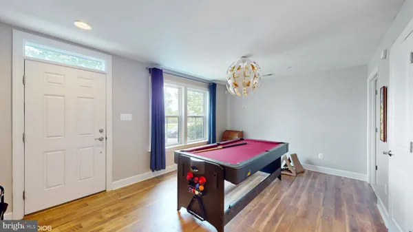 a bed room with a bed and a window