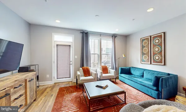 a living room with furniture and a couch