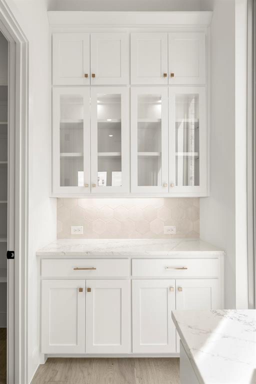 4416 Meander Way Prosper, TX 75078 - Photo 13 of 40 a view of white cabinets and sink