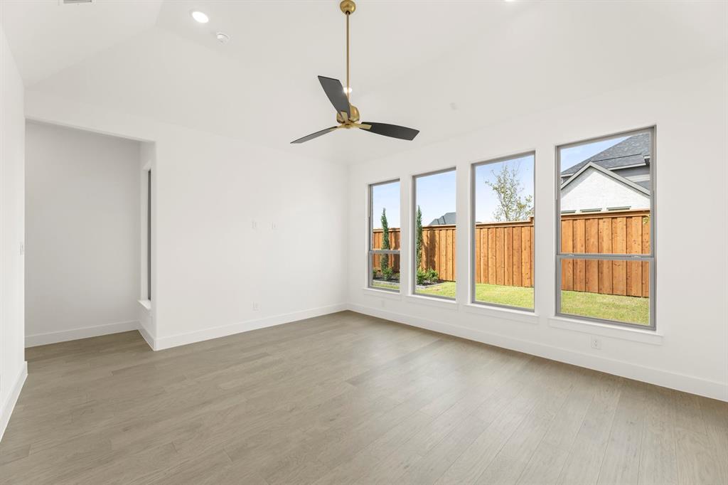 4416 Meander Way Prosper, TX 75078 - Photo 18 of 40 a view of an empty room with a window