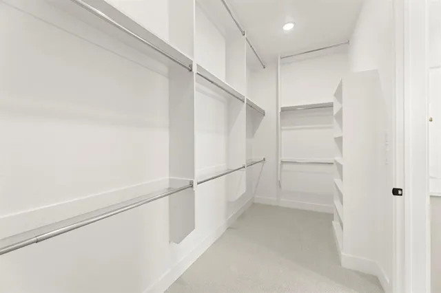 a view of an empty walk in closet