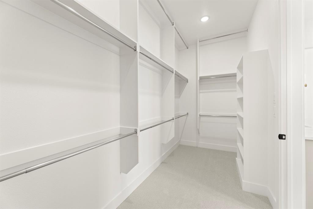 4416 Meander Way Prosper, TX 75078 - Photo 24 of 40 a view of an empty walk in closet