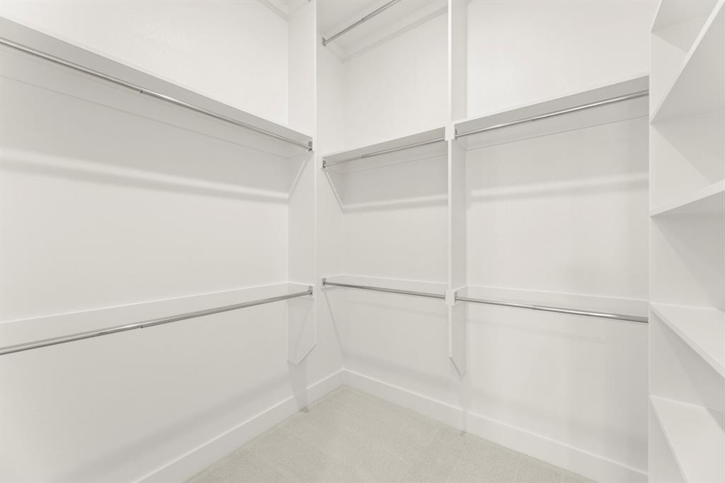 4416 Meander Way Prosper, TX 75078 - Photo 25 of 40 a view of an empty walk in closet