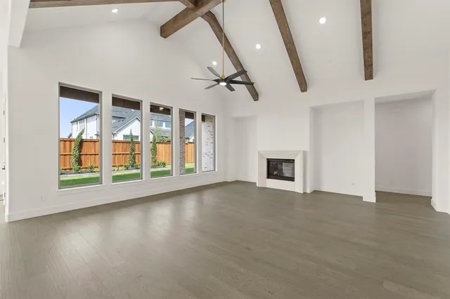 a large kitchen with kitchen island a sink stainless steel appliances and cabinets