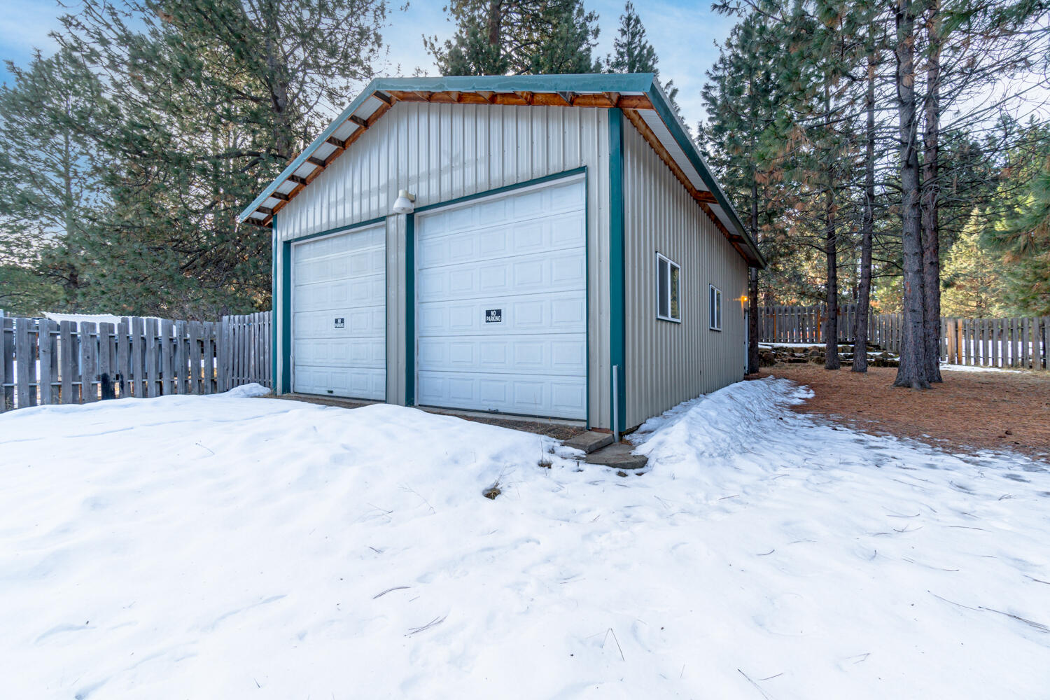 19291 Indian Summer Road Bend, OR 97702 - Photo 32 of 41 24' x 36' partially insulated shop and two 10' roll up doors and 220amp.