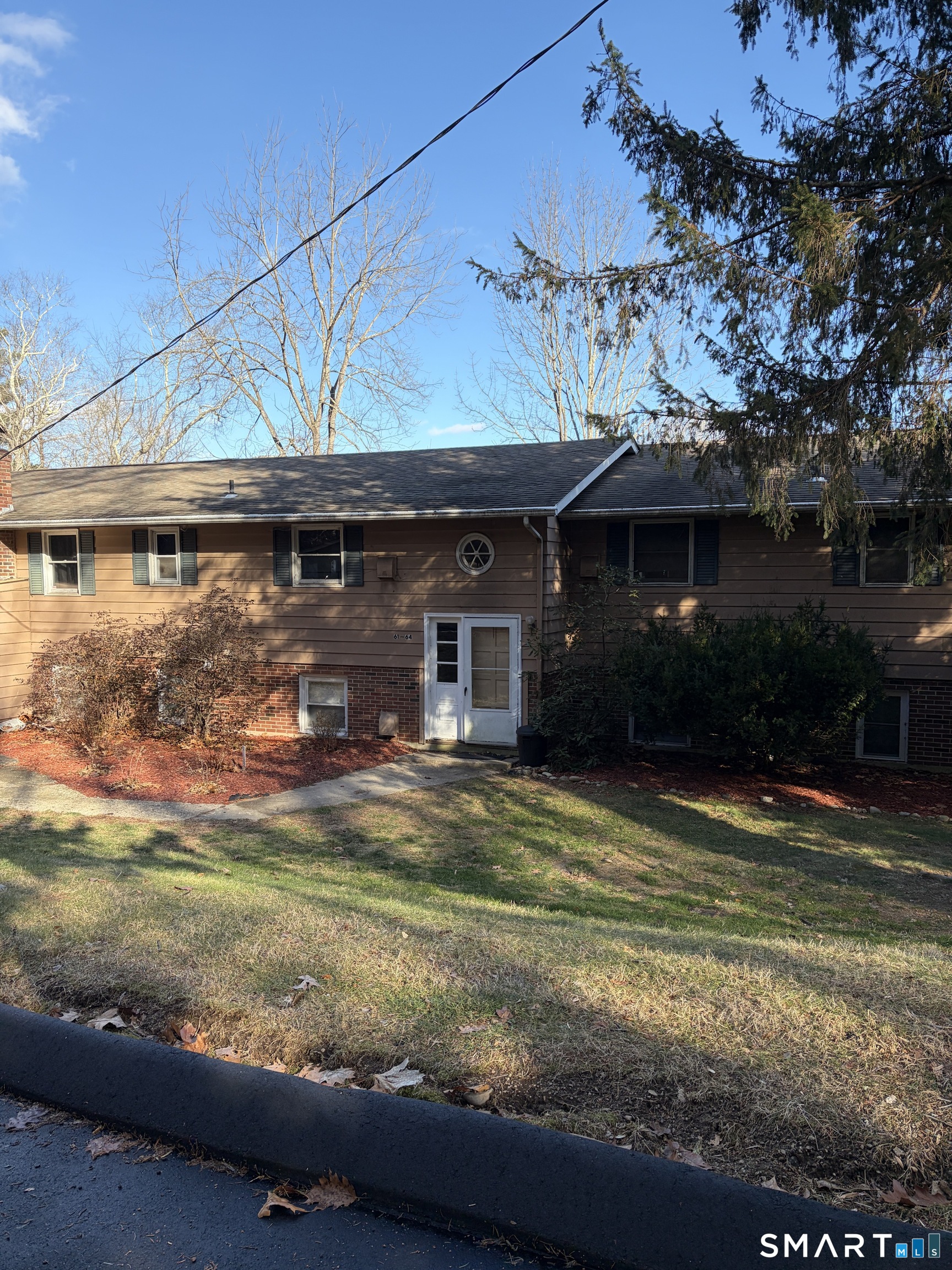 270 South Windham Road, Unit 63 Willimantic, CT 06226 - Photo 1 of 18 a view of a house with a swimming pool