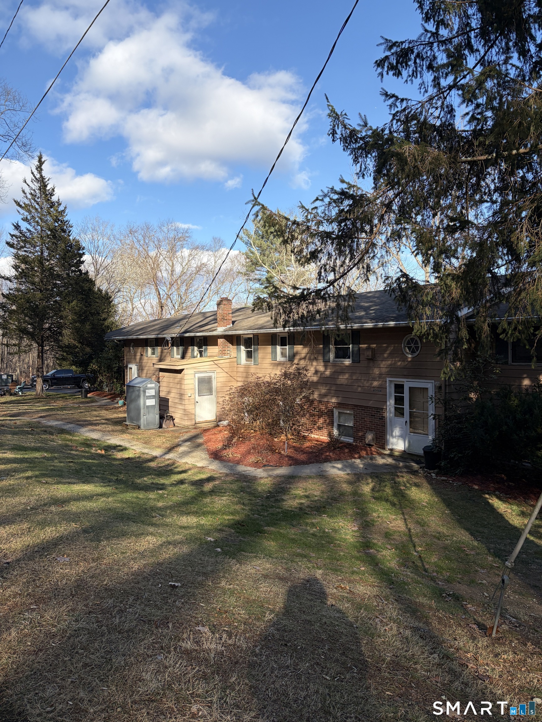270 South Windham Road, Unit 63 Windham, CT 06226 - Photo 18 of 19 a view of a house with a yard