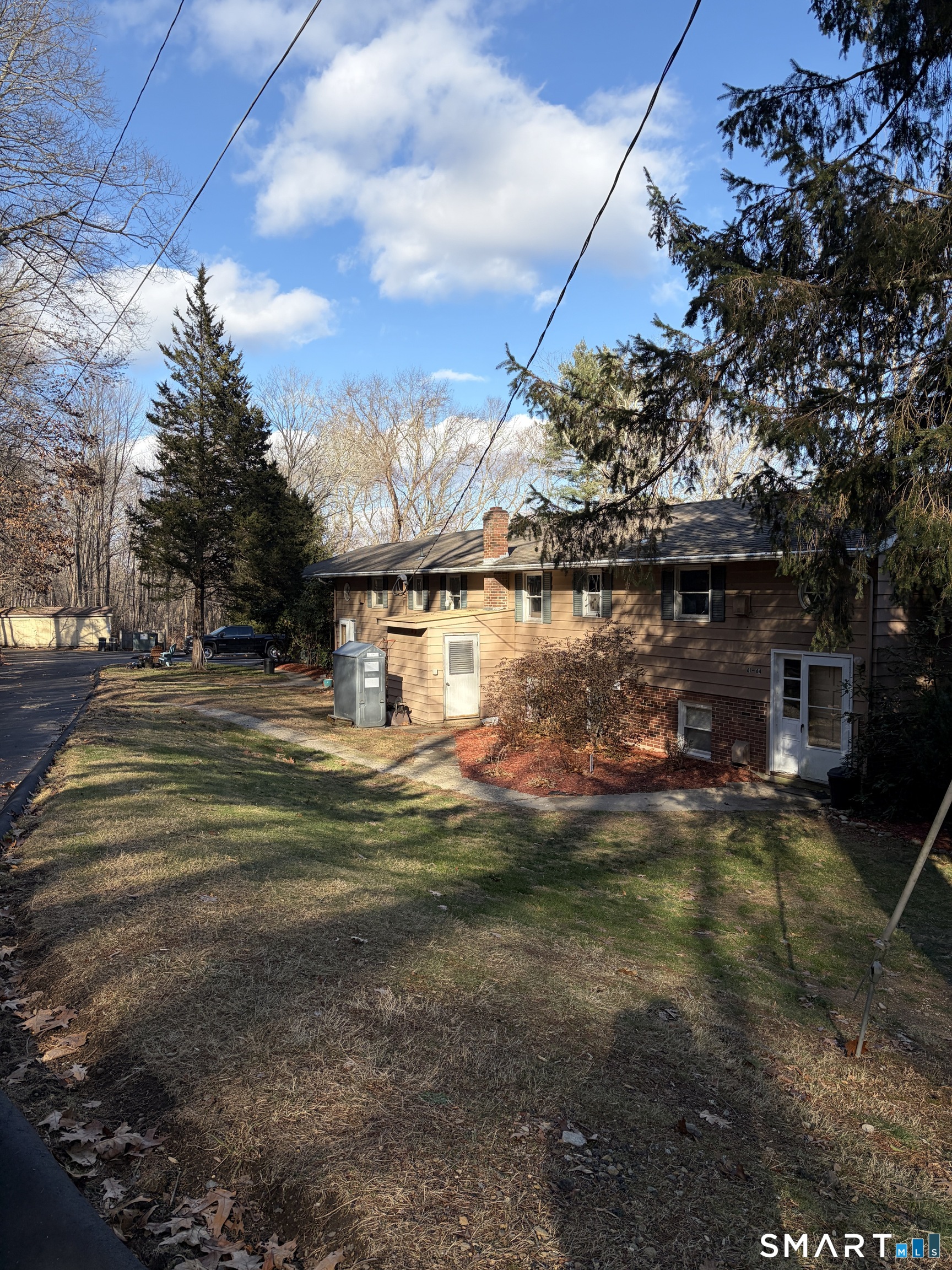 270 South Windham Road, Unit 63 Windham, CT 06226 - Photo 19 of 19 a view of a house with a big yard