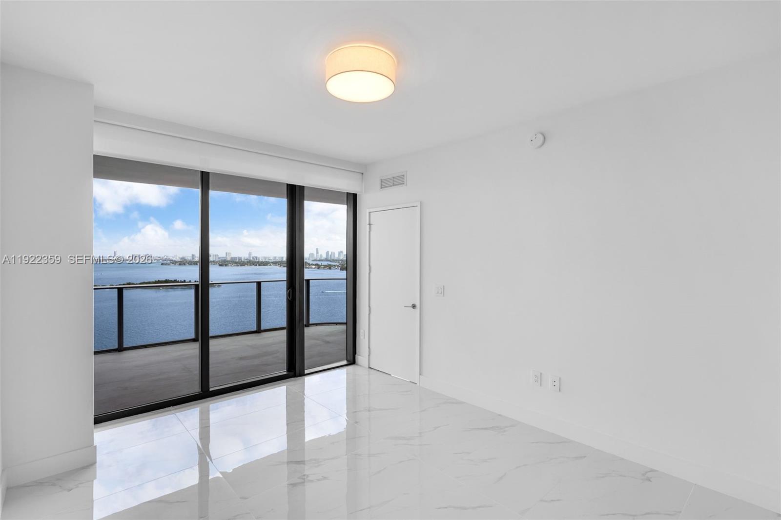 700 Northeast 24th Street, Unit 2003 Miami, FL 33137 - Photo 23 of 87 a view of an empty room with a window