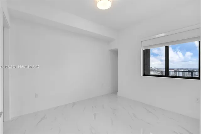 a view of water heater room with floor to ceiling window