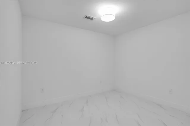 a view of a swimming pool and a yard