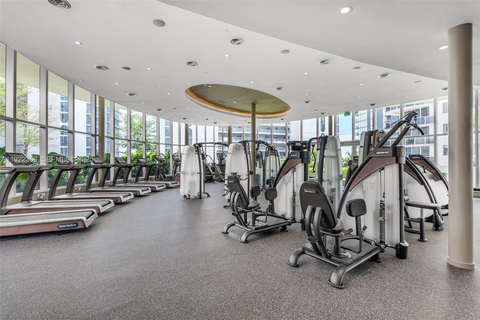 700 Northeast 24th Street, Unit 2003 Miami, FL 33137 - Photo 46 of 87 a view of a room with gym equipment