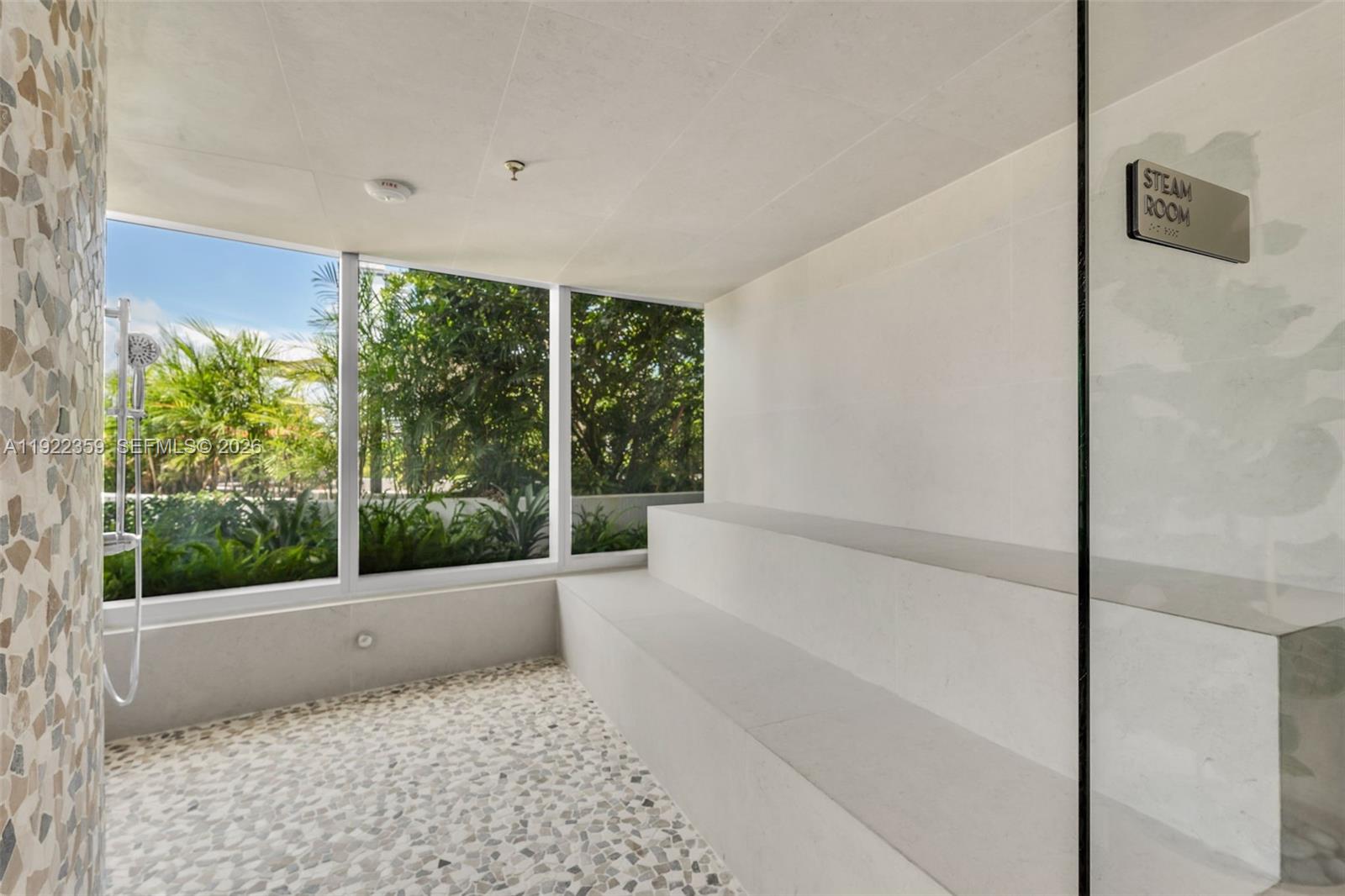700 Northeast 24th Street, Unit 2003 Miami, FL 33137 - Photo 56 of 87 a bathroom with a bathtub and a large window