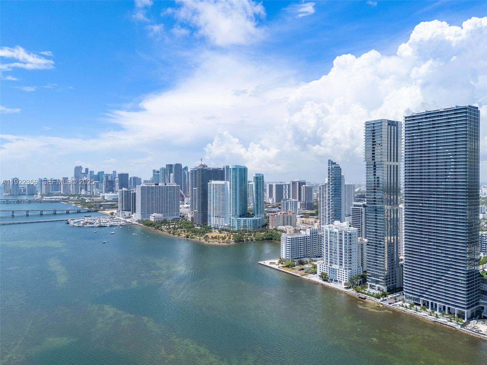 700 Northeast 24th Street, Unit 2003 Miami, FL 33137 - Photo 6 of 87 a view of city and a lake