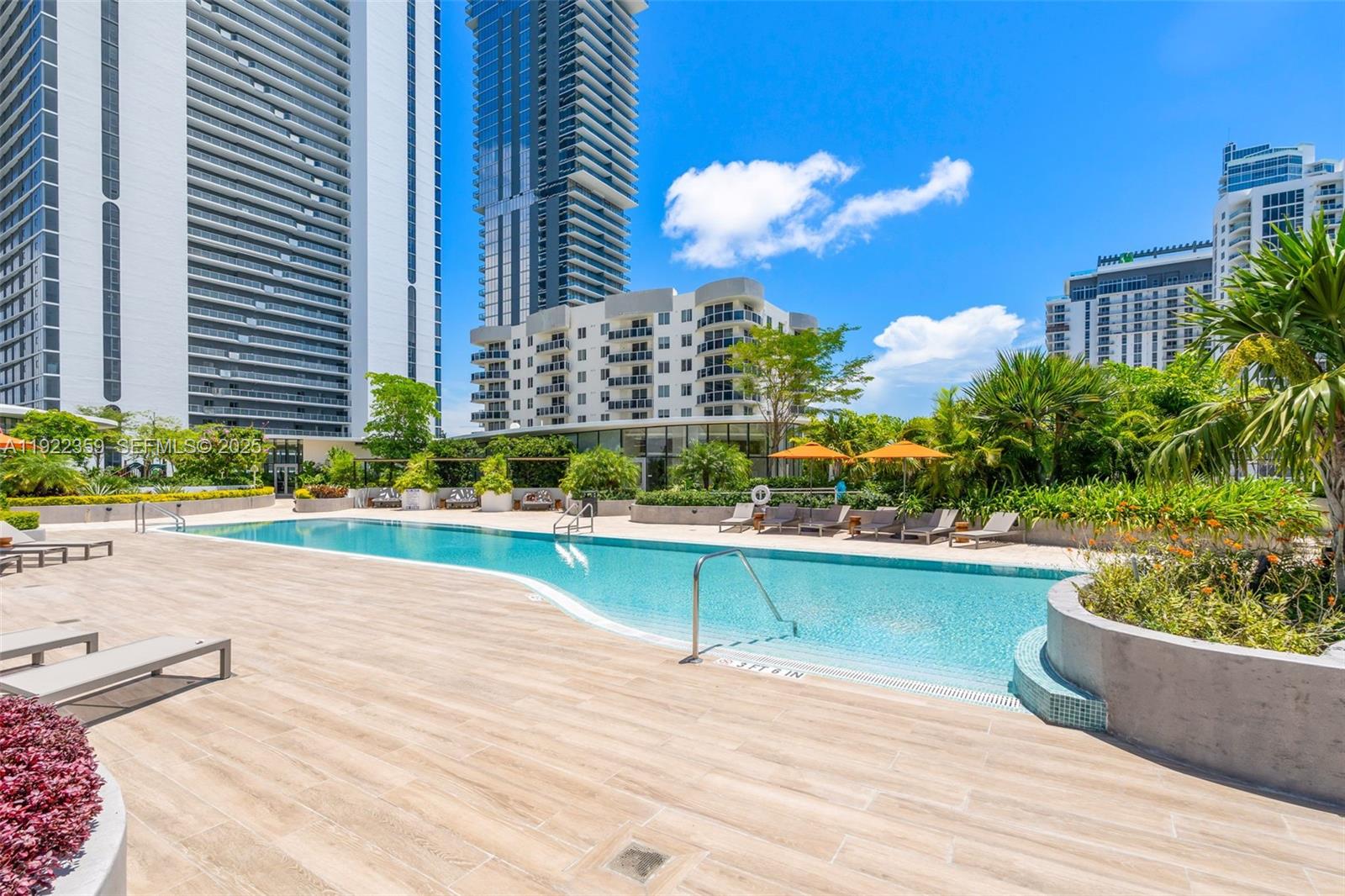700 Northeast 24th Street, Unit 2003 Miami, FL 33137 - Photo 66 of 87 a view of a swimming pool with a patio