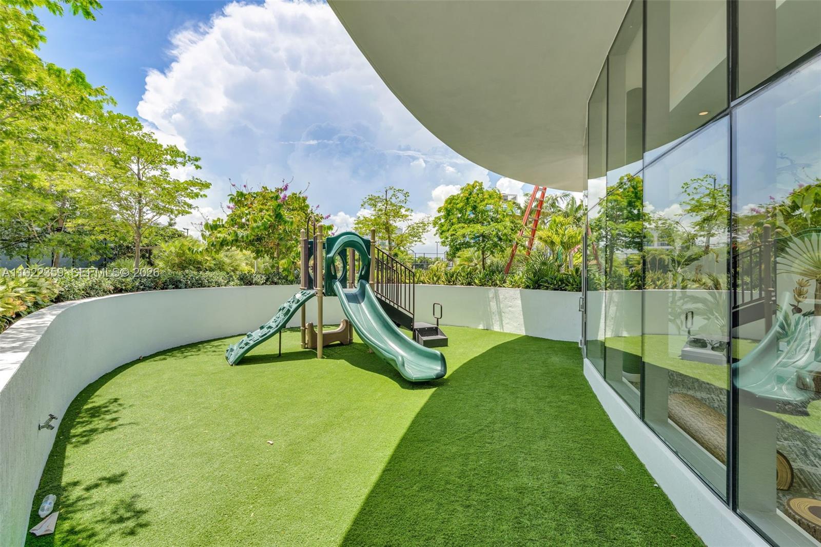 700 Northeast 24th Street, Unit 2003 Miami, FL 33137 - Photo 70 of 87 a garden view with a sitting space