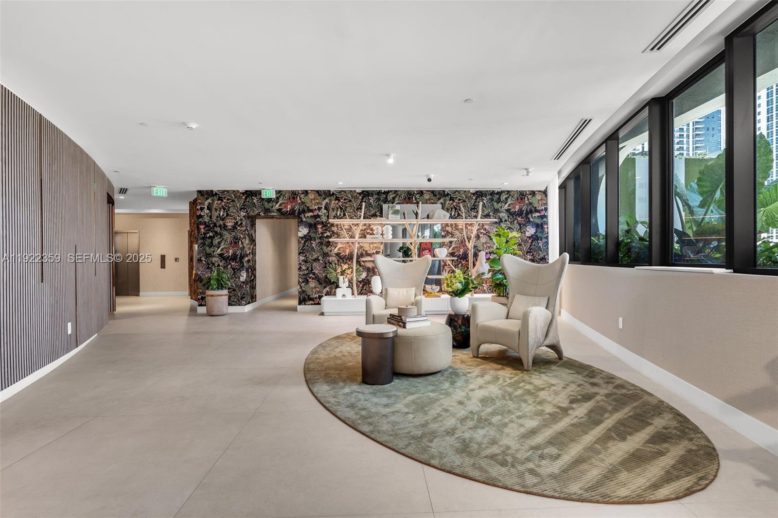 700 Northeast 24th Street, Unit 2003 Miami, FL 33137 - Photo 81 of 87 a view of a living room and workspace