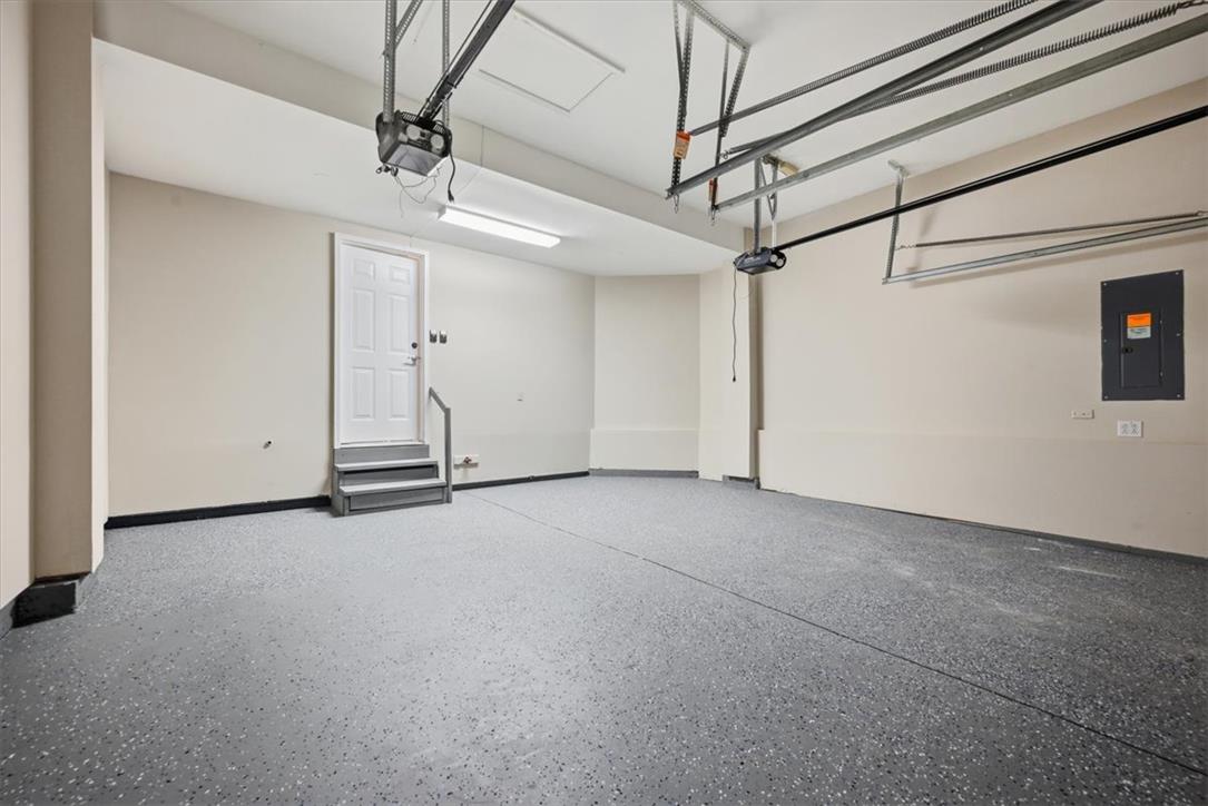 8761 Cascade Road Breinigsville, PA 18031 - Photo 83 of 84 A spacious, pristine garage features an epoxy floor and direct interior access.
