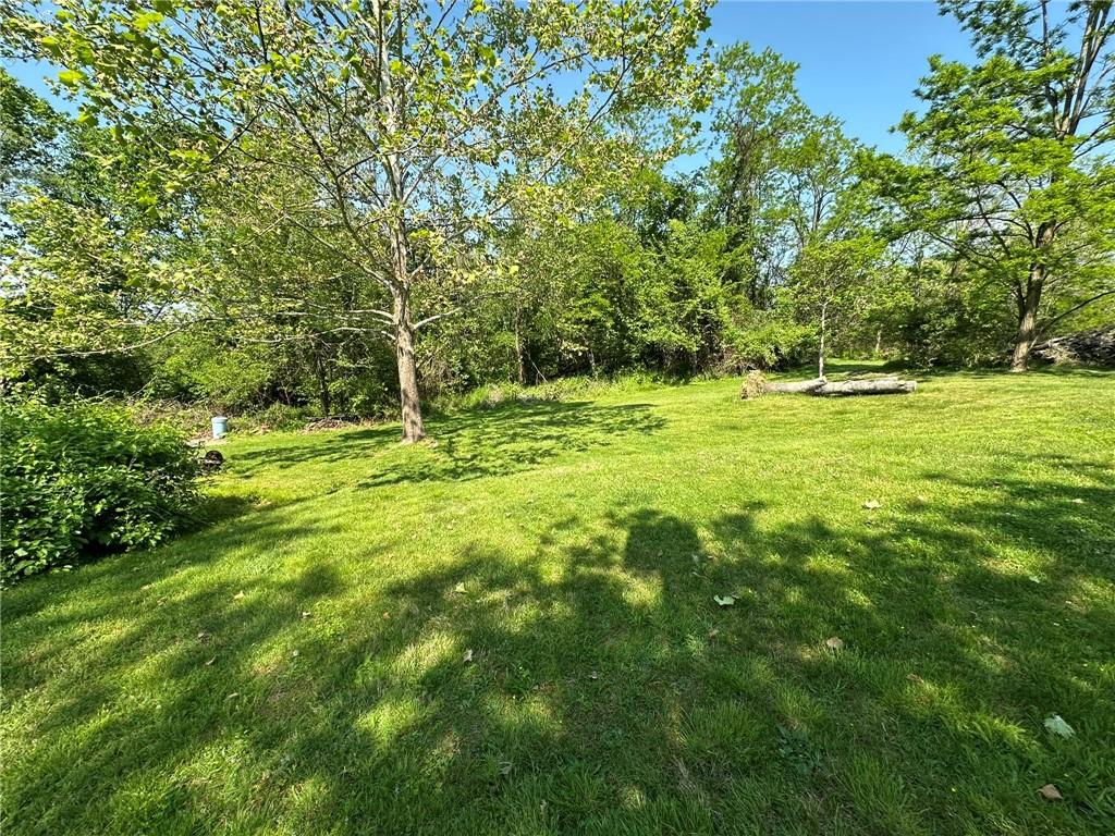 0 East McMurray Road Venetia, PA 15367 - Photo 4 of 12 a big yard with lots of green space and trees