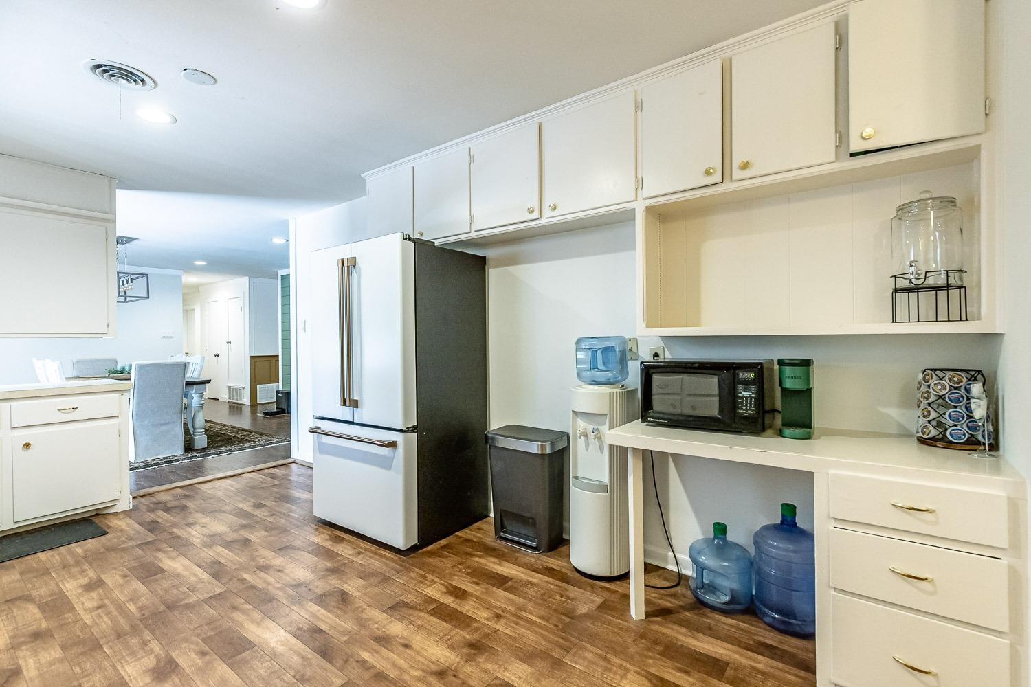 3604 48th Street Lubbock, TX 79413 - Photo 14 of 50 a kitchen with stainless steel appliances a refrigerator sink and cabinets