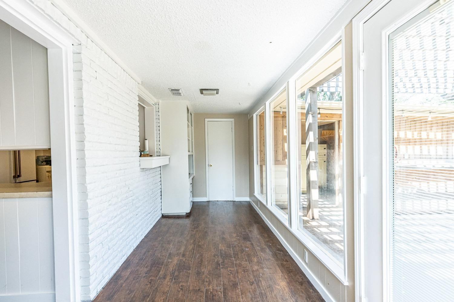 3604 48th Street Lubbock, TX 79413 - Photo 35 of 50 a view of a hallway with a large window