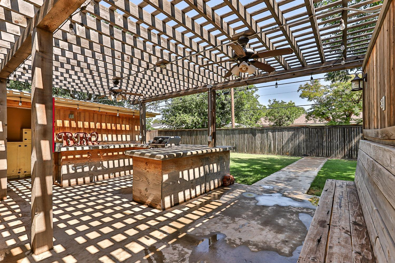 3604 48th Street Lubbock, TX 79413 - Photo 37 of 50 a view of a porch with a swing