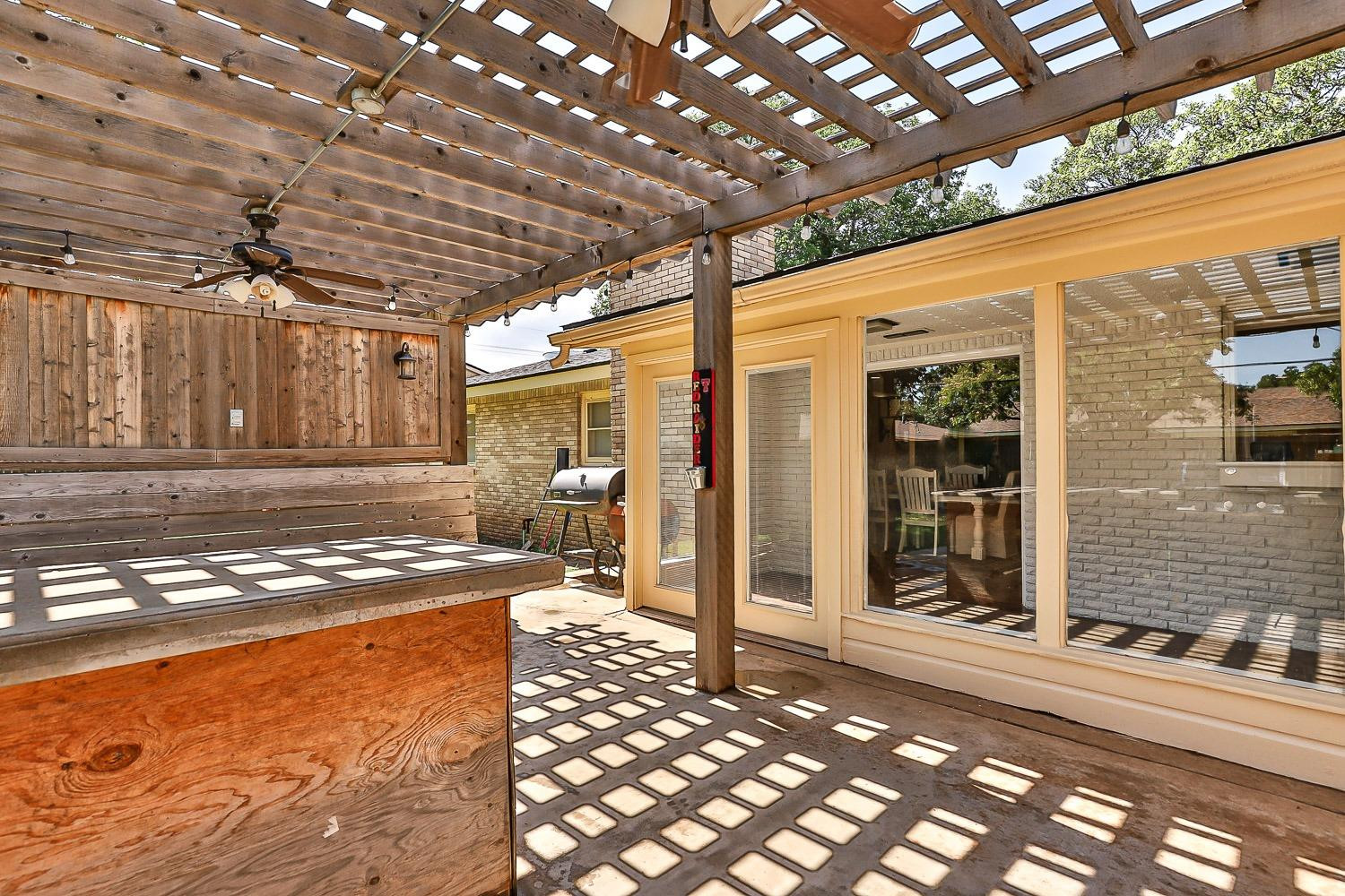 3604 48th Street Lubbock, TX 79413 - Photo 47 of 50 a view of a hall with wooden floor