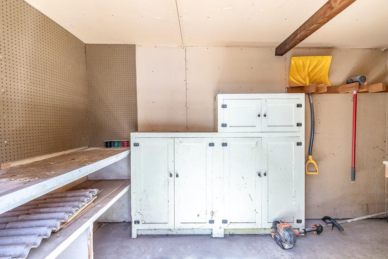 3604 48th Street Lubbock, TX 79413 - Photo 50 of 50 a room with a wooden floor and white walls