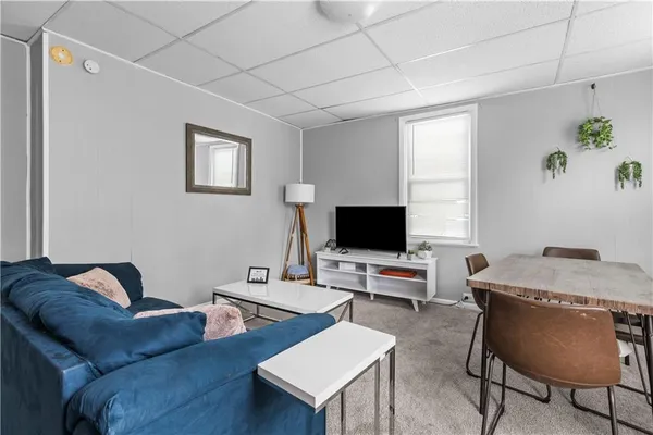 a workspace with furniture and window