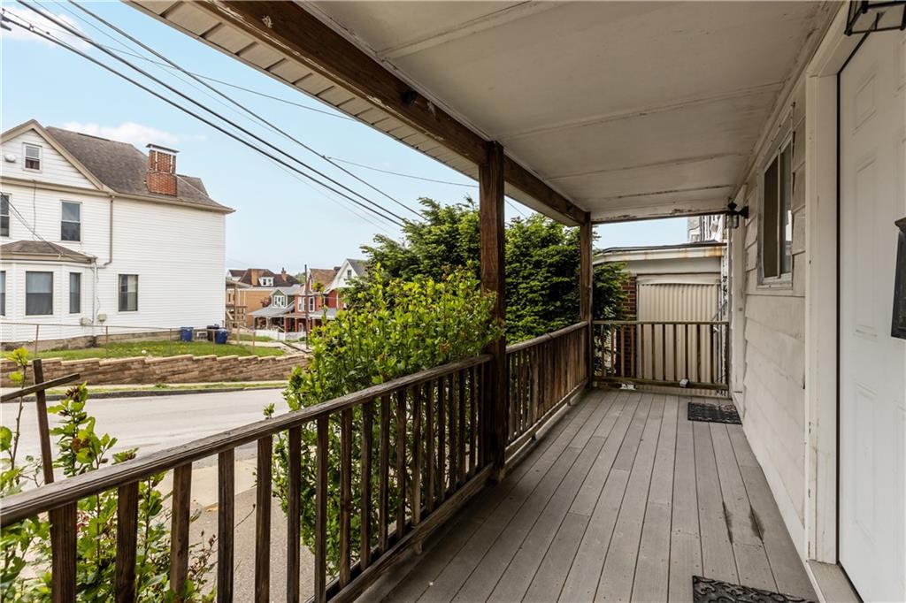 17 Lelia Street Pittsburgh, PA 15211 - Photo 24 of 26 a view of balcony with wooden floor